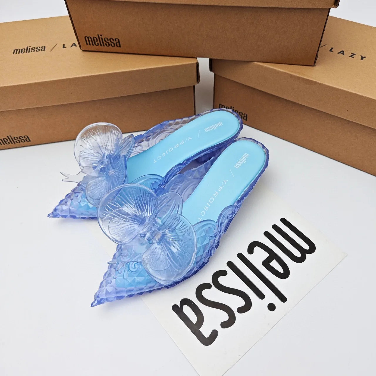 Design Big Butterfly Knot Slides Women Flat Mules Sandals High Quality Cozy PVC Transparent Sandals Pointed Toe Back Strap Shoes